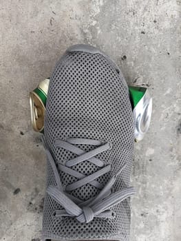 human foot stomp cans flat