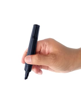 Man hand holding black magic pen on white