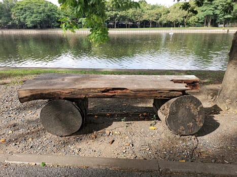 Old wooden bench or wooden chair in the park