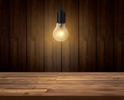 Light bulb with wood wall background, wood table