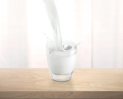Pouring milk into glass cup with splashing, on wooden table