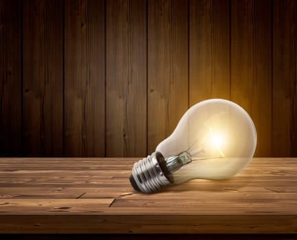 white light bulbs glowing on wooden floor