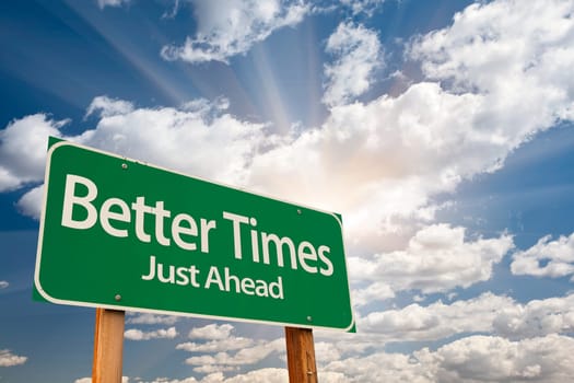 Better Times Green Road Sign Over Sunny Dramatic Clouds and Sky.
