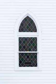Beautiful Stained Glass Window On Wall of Church.