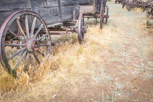 Abstract of Vintage Antique Wood Wagons and Wheels.