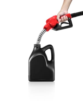 A man fills jerry cans at a gas station