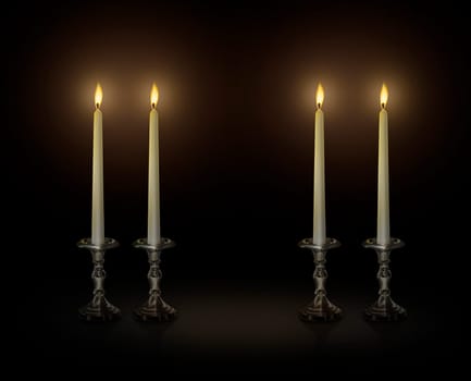 Candle light on a candlestick on a black background