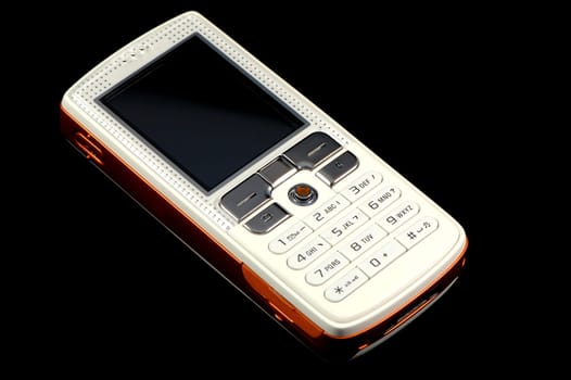 Close up of modern mobile phone over black