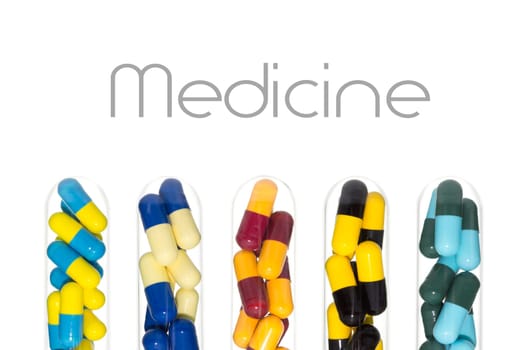 Various color of drug or pill or vitamin capsule in test tube isolated on white background. Background about medical or clinic or pharmacy or hospital story.