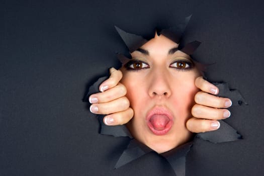 Tongue IN Woman Pushes Face Through Hole in Wall
