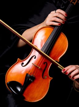 A beautiful pair of hands holds a great Violin