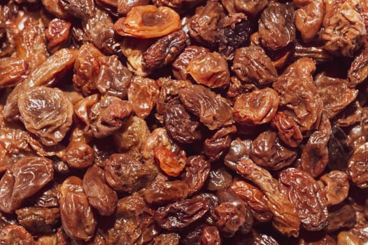 Dried raisins on a white background. Raw grapes and raisins. Healthy and fresh nuts. close-up. Local name besni uzum