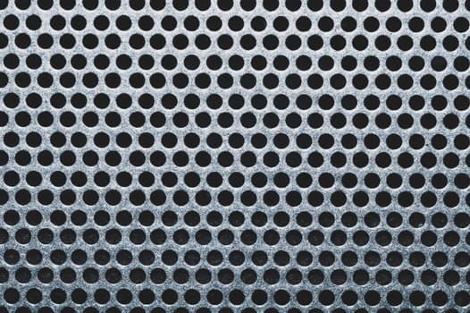 Gray metal grate with round holes. ventilation mesh