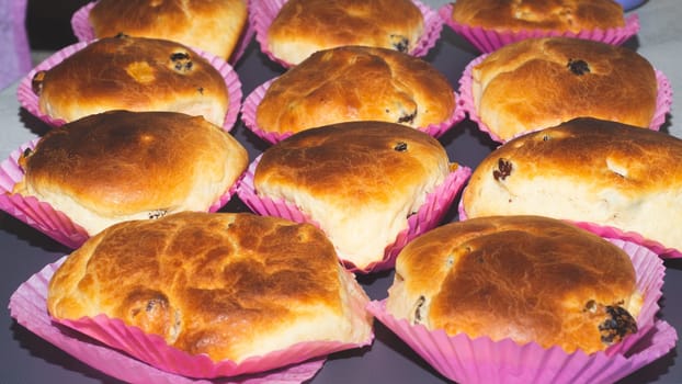 Homemade buns with raisins. baked pies