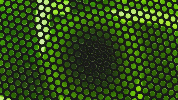 Green light shines through the ventilation grid holes of computer air cooling system. abstract background
