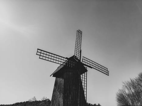 Old wooden windmill. rural building. black and white