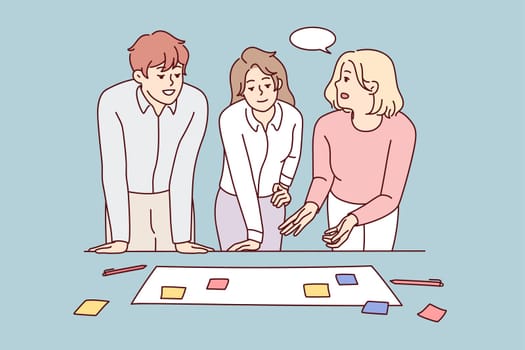Businesspeople brainstorm at office meeting discuss business ideas with sticky notes together. Smiling employees or colleagues engaged in teamwork activity. Vector illustration.