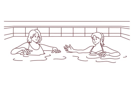 Women in swimsuits have fun in swimming pool together. Female friends in bikini swim in water in indoor pool. Hobby and recreation. Vector illustration.