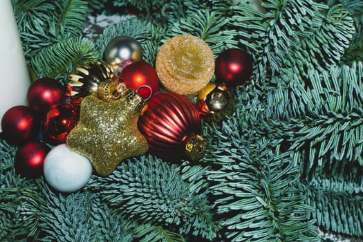 Artificial fir tree branches with Christmas tree toys
