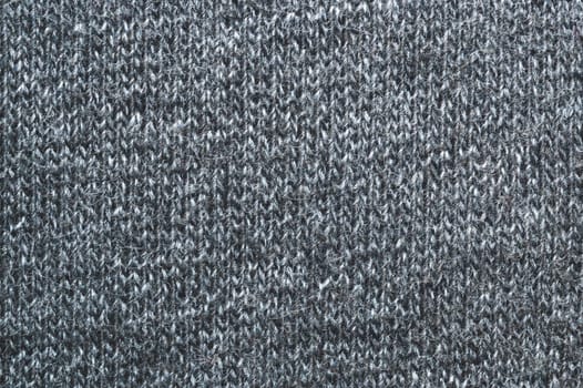 Gray knitted texture. fabric close up. textile background