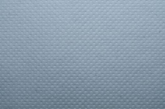 White dotted paper macro. background. napkin surface close up