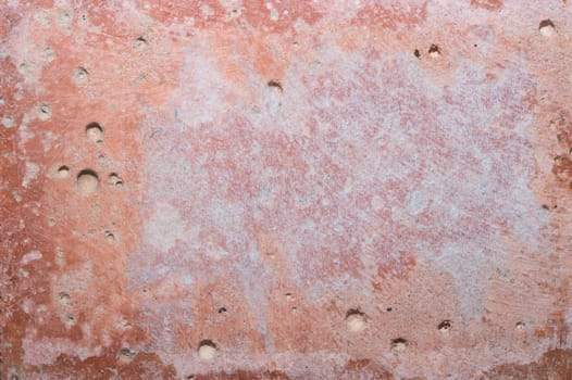 Old brown stone wall. aged concrete background. rough shabby cement backdrop