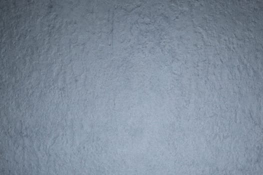 Rough wall background. uneven gray surface backdrop