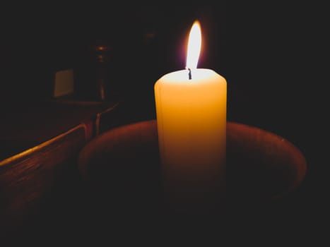 candle flame in the dark close up
