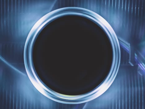 Computer cooling fan with blue light abstract background. cooler in action with led close up. power in motion concept. round copy space in the middle