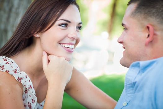 Happy Romantic Caucasian Couple Portrait in the Park.
