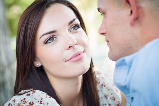 Happy Romantic Caucasian Couple Portrait in the Park.