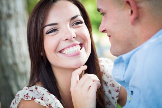 Happy Romantic Caucasian Couple Portrait in the Park.