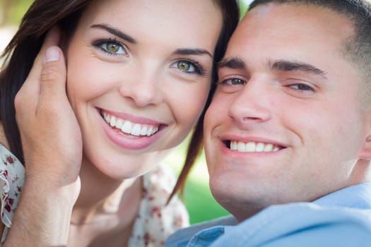 Happy Romantic Caucasian Couple Portrait in the Park.
