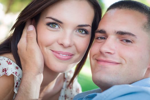 Happy Romantic Caucasian Couple Portrait in the Park.