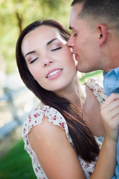 Happy Romantic Caucasian Couple Portrait in the Park.