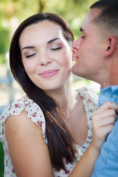 Happy Romantic Caucasian Couple Portrait in the Park.