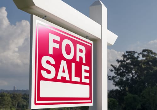 Close-up of House For Sale Real Estate Sign.