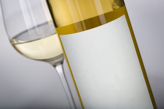 Wine Glass and Bottle with Blank Label Ready For Graphic and Text.