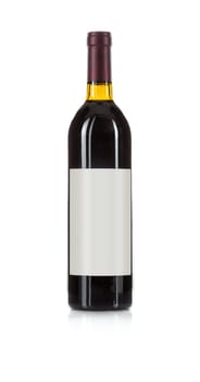 Wine Bottle with Dark Colored Wine and Blank Wine Label Ready for You Own Design and Text Against a White Background..