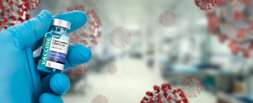 Doctor or Nurse Holding Coronavirus COVID-19 Vaccine Vial Against Molecule and Hospital Banner.
