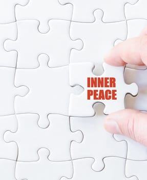 Last puzzle piece with words   INNER PEACE. Concept image