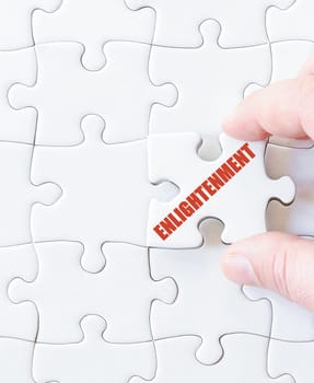 Last puzzle piece with word  ENLIGHTENMENT. Concept image