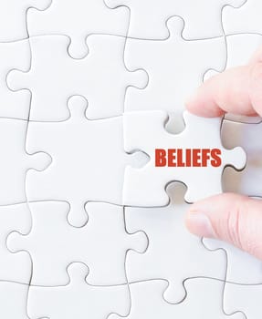 Last puzzle piece with word  BELIEFS. Concept image