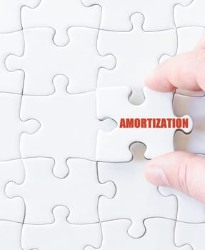 Last puzzle piece with word  AMORTIZATION. Concept image