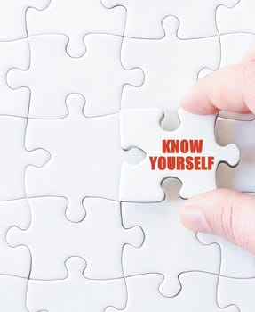 Last puzzle piece with words  KNOW YOURSELF. Concept image
