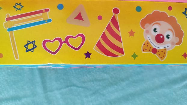 clown hat Purim holiday background cartoon art deco children gifts. High quality photo