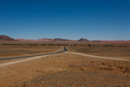 Panorama trought red dunes from Sesriem to Sossusvlei, Namibia
