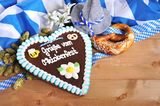 original Bavarian gingerbread heart with Oktoberfest hat and laugenbreze