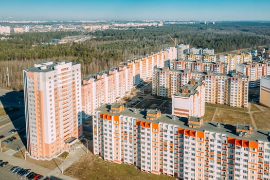 Gomel, Belarus. Aerial Bird's-eye View Of New Residential Multi-storey Houses. Cityscape Skyline In Sunny Spring Day. Real Estate, Development Industry. High-rise Buildings.