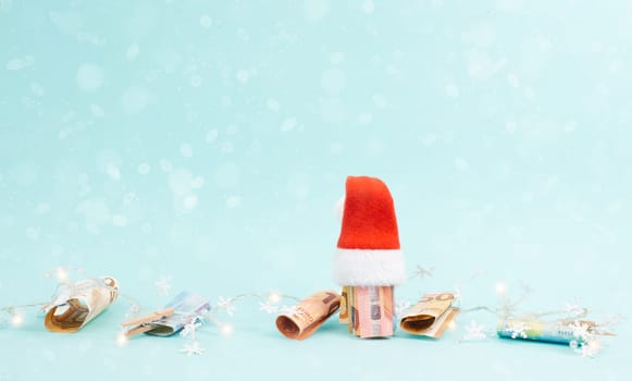 Christmas fairy lights with money, increase of electricity costs, save energy at the holiday season